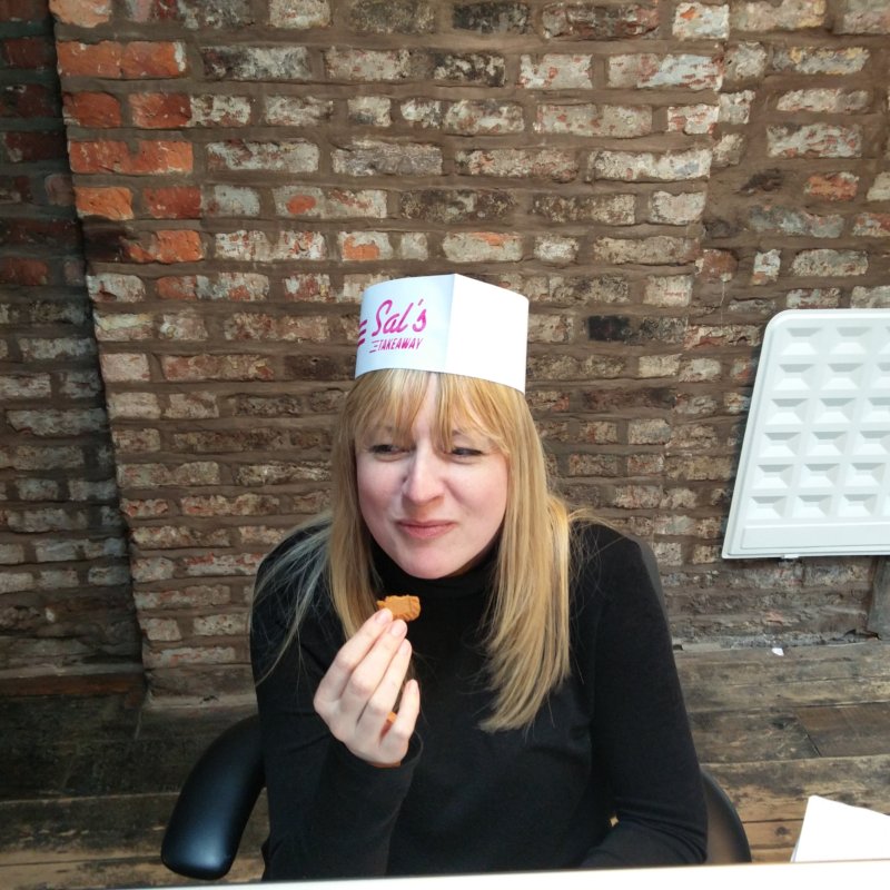 Sally eating a biscuit in the studio